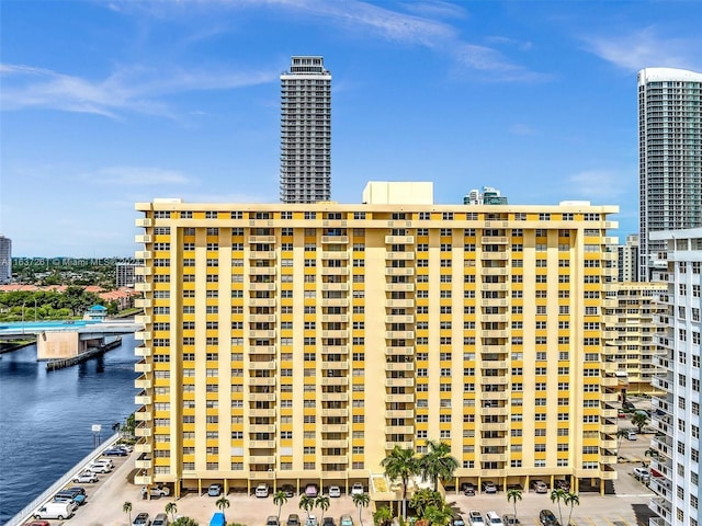 view of building exterior with a water view