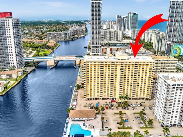 birds eye view of property featuring a water view