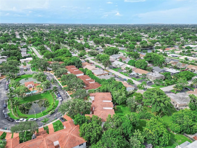 aerial view of property's location with nearby suburban area