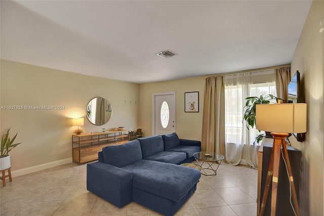 living room featuring light tile patterned flooring