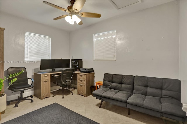 tiled home office with ceiling fan