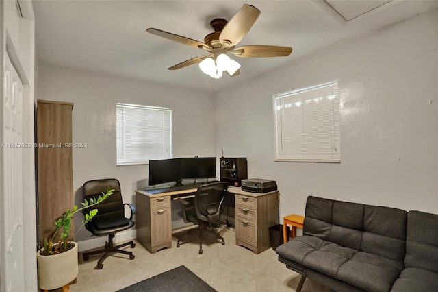 office space with ceiling fan and light tile patterned floors