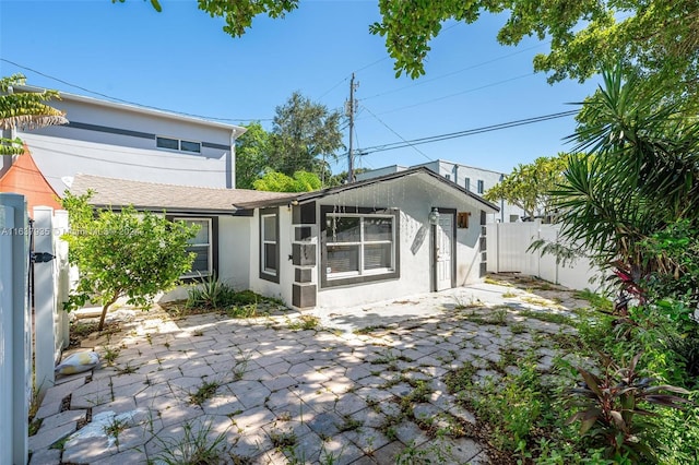 rear view of property with a patio