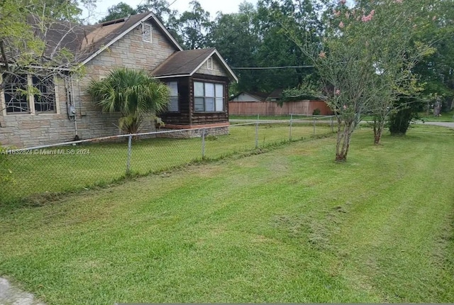 view of yard with fence