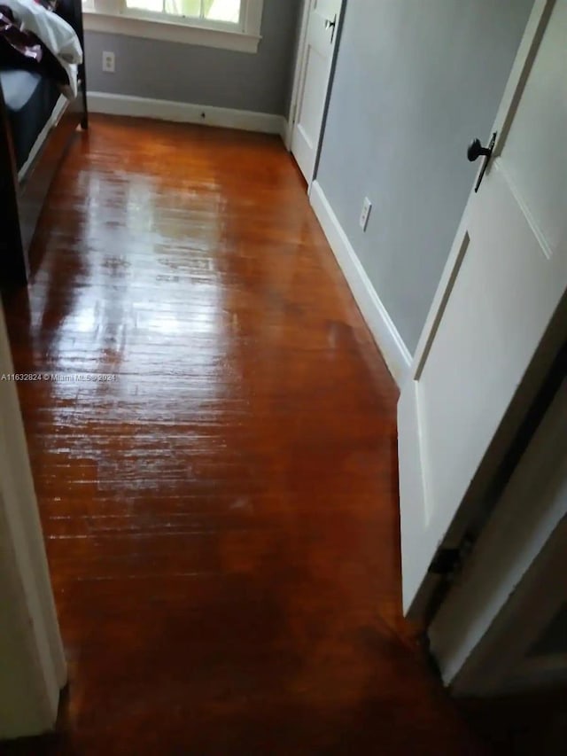 hall featuring wood-type flooring