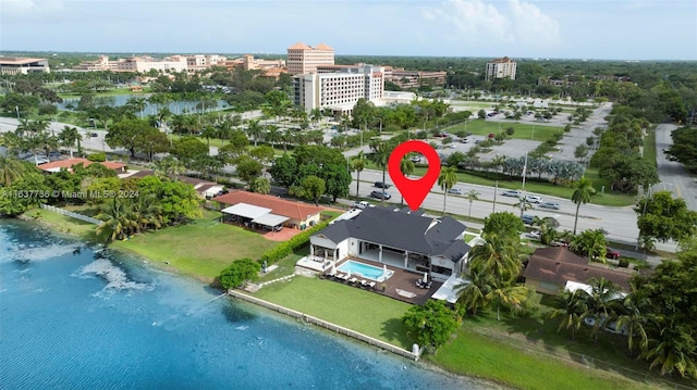 bird's eye view with a water view