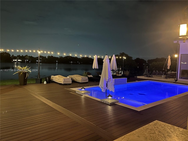 pool at twilight with a water view