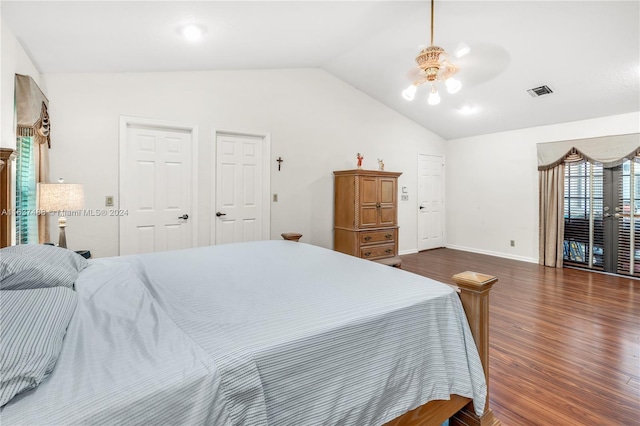 bedroom with french doors, vaulted ceiling, ceiling fan, and dark wood-type flooring