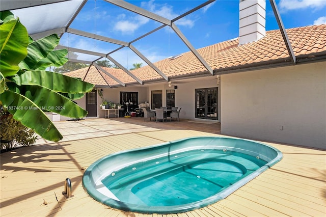 view of pool featuring a lanai and a patio area