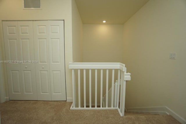 staircase with recessed lighting, visible vents, carpet floors, and baseboards