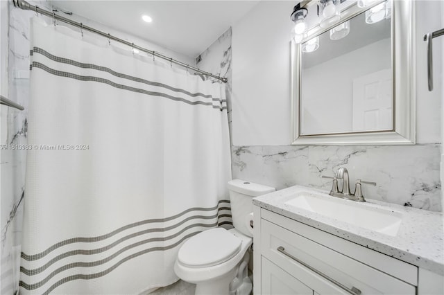 bathroom featuring backsplash, tile walls, toilet, and vanity