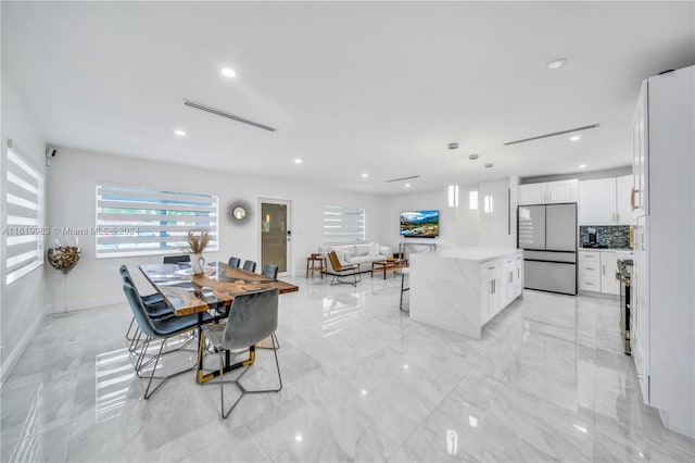 view of tiled dining space