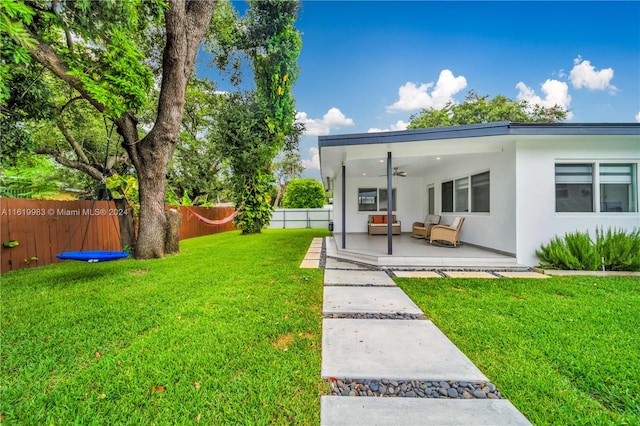 exterior space featuring a patio area and a yard