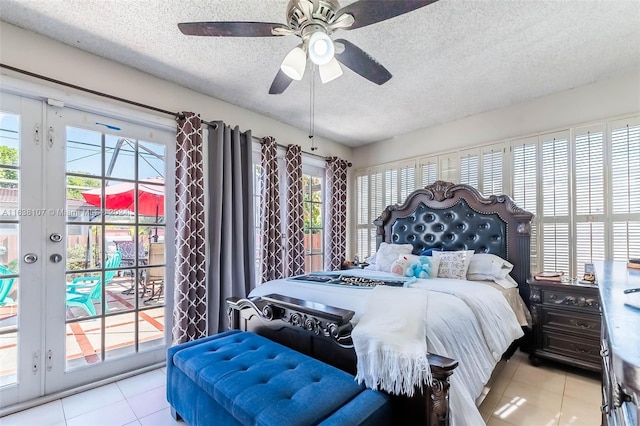 bedroom featuring a textured ceiling, access to outside, ceiling fan, and light tile patterned flooring