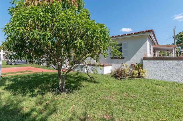 view of property exterior featuring a yard