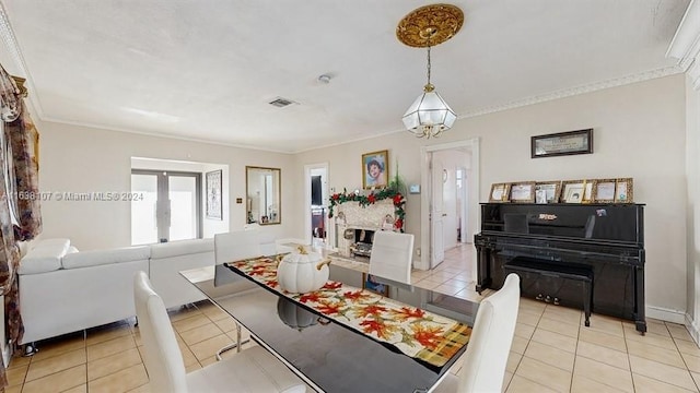 tiled dining room with ornamental molding