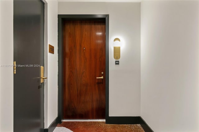 entrance to property featuring elevator