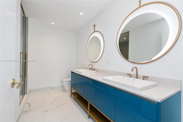 bathroom featuring tile patterned floors, dual bowl vanity, and toilet