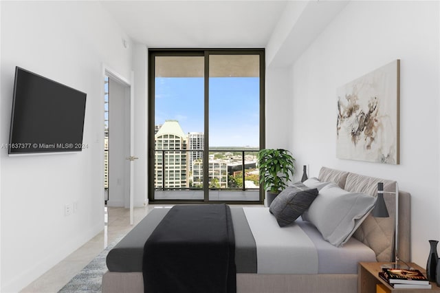 tiled bedroom with access to exterior and floor to ceiling windows