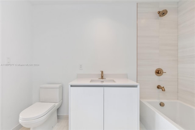 full bathroom with vanity, tiled shower / bath combo, toilet, and tile patterned floors