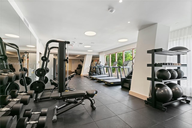 workout area with tile patterned floors