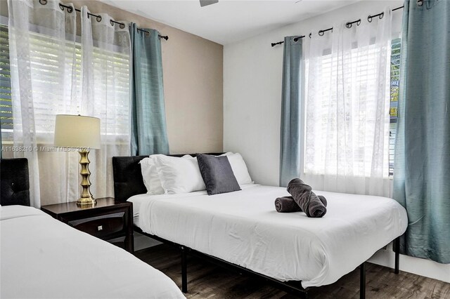 bedroom featuring wood-type flooring