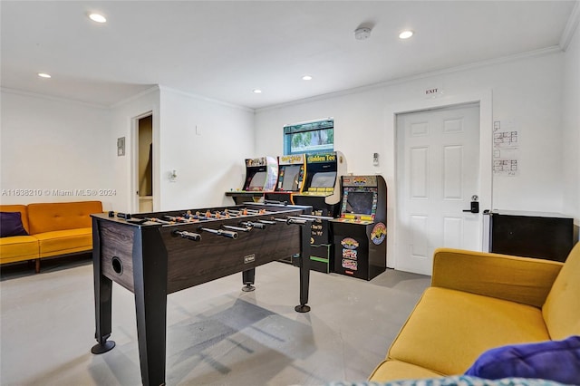 game room with crown molding