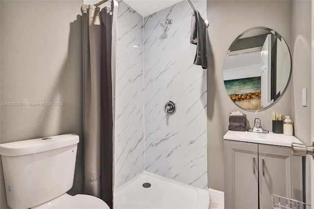 bathroom with vanity, a shower with curtain, and toilet