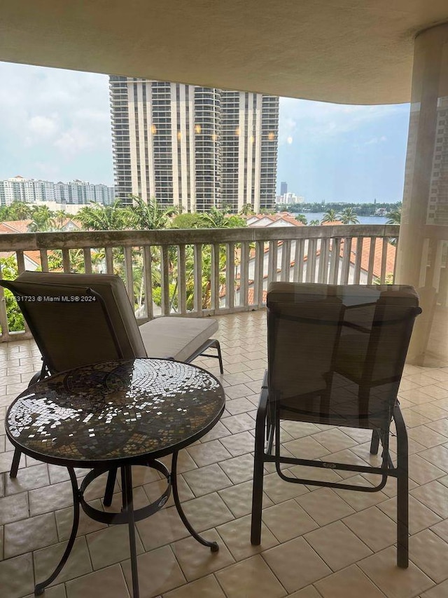 balcony featuring a city view