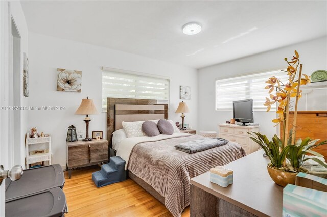 bedroom featuring light hardwood / wood-style floors