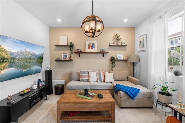 living room featuring a notable chandelier and light tile patterned floors