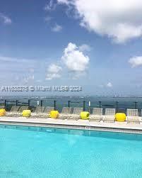 community pool featuring fence