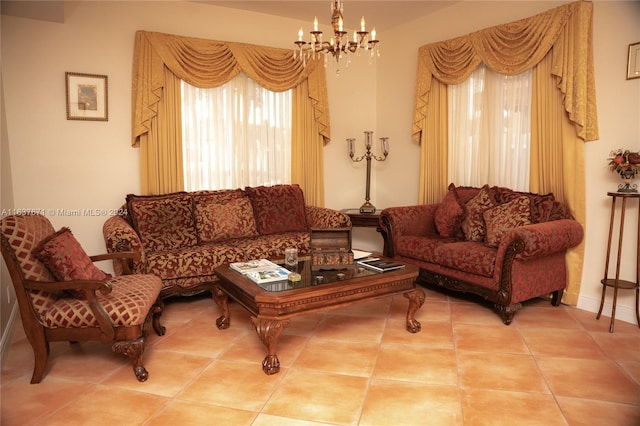 living room with a notable chandelier and light tile patterned flooring