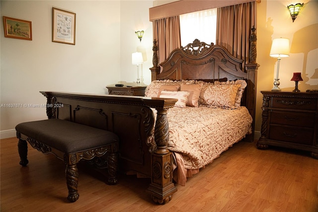 bedroom featuring hardwood / wood-style floors