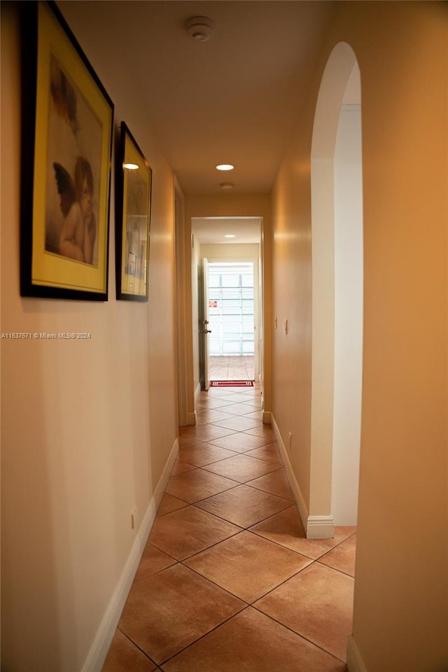 hallway featuring tile patterned floors