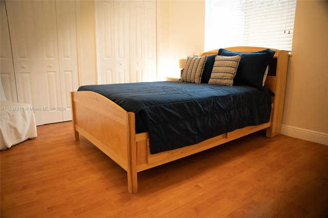 bedroom featuring wood-type flooring