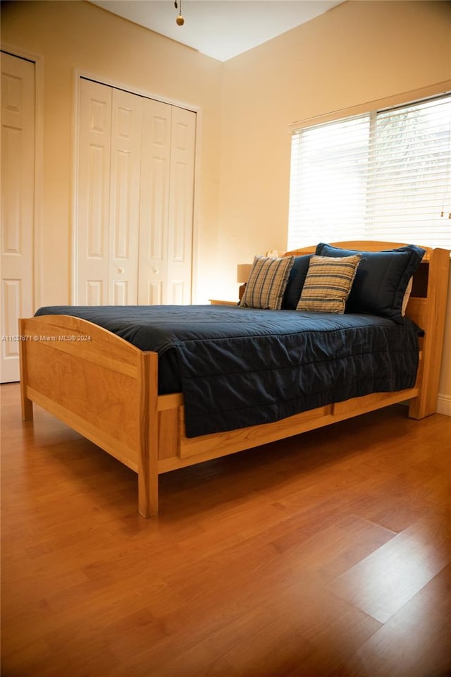 bedroom featuring hardwood / wood-style floors