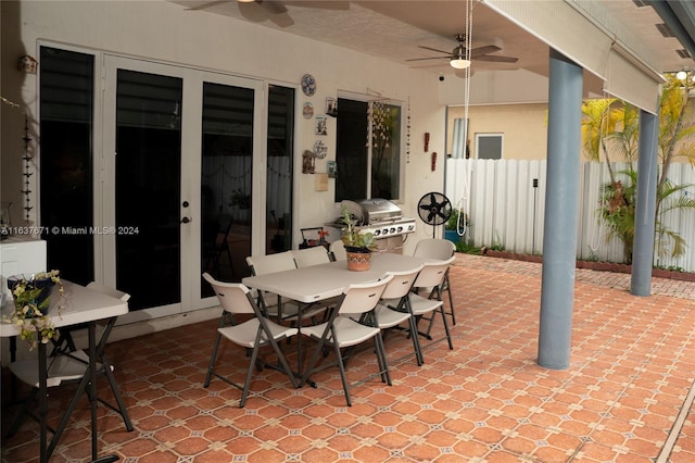 view of patio featuring ceiling fan and a grill