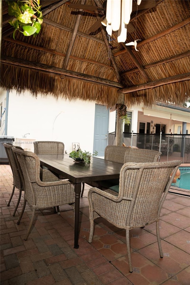 view of patio / terrace featuring a gazebo and ceiling fan