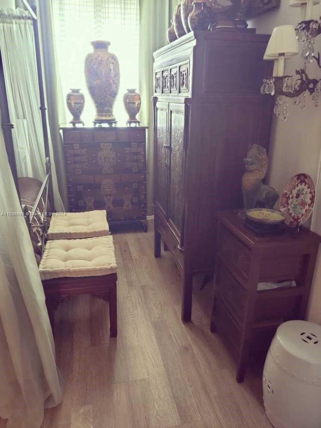 bedroom with hardwood / wood-style floors