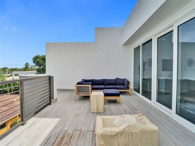 wooden deck with outdoor lounge area