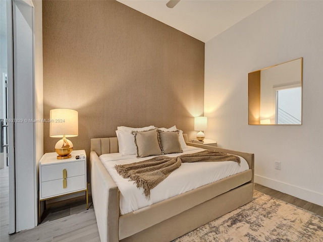 bedroom featuring light hardwood / wood-style floors