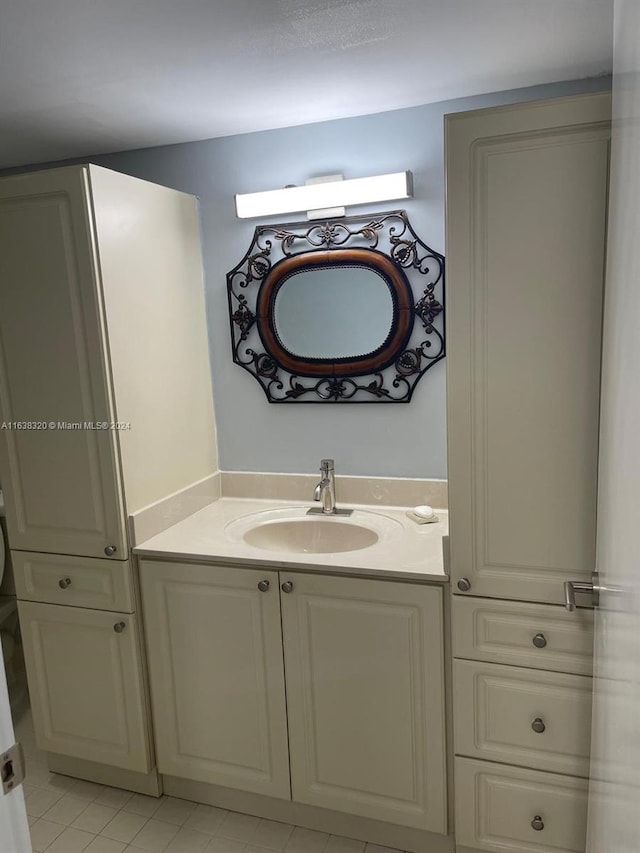 bathroom featuring vanity and tile patterned floors