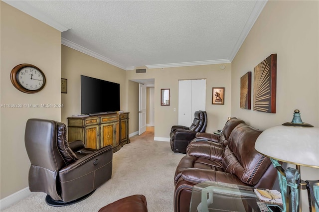 carpeted living room with a textured ceiling and ornamental molding