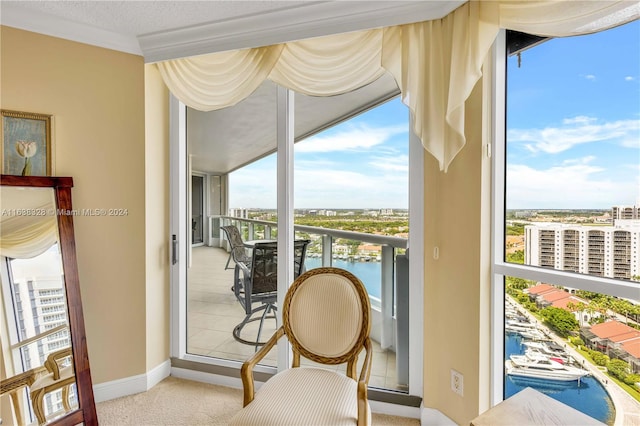 balcony featuring a water view