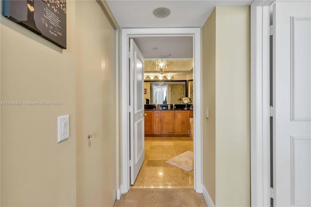 hallway featuring light tile patterned flooring