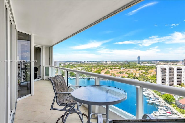 balcony featuring a water view