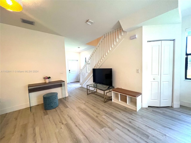 sitting room with light hardwood / wood-style floors