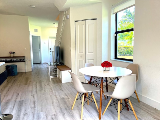 dining area featuring light hardwood / wood-style floors