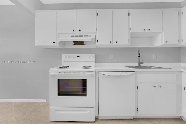 kitchen featuring white cabinetry, white appliances, sink, and light tile patterned flooring